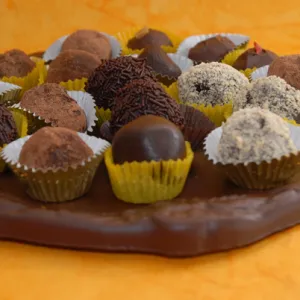 Set of chocolate truffles on a chocolate platter
